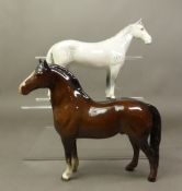 Beswick brown gloss figure of a Welsh Cob, together with a grey gloss Huntsman's Horse 1484 (2).