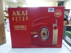 Boxed and unused Akai Retro Portable DAB/FM Radio, model number A60010RDABBT.