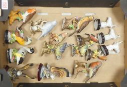 A collection of various ceramic and porcelain birds to include Eagle's, Robin's and Blue Tit's