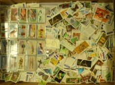 A large selection of loose cigarette cards. (1 Tray)