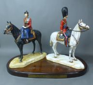Two Michael Sutty Royal commemorative Silver Jubilee Trooping the Colour figures. Modelled as the