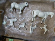 A group of Beswick horse and ponies including Mare facing right model 1812, Royal Doulton Shetland