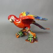 An enamelled Lafiore parrot trinket box hand painted on a metal base