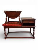 Dark oak telephone seat with red velvet uphosltered cushion and single drawer storage. W87cm