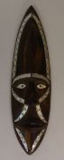 Handcrafted oval inlaid wood wall plaque, depicting a scene of elephants walking amongst trees, hand