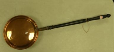 Copper and brass bed pan with ebonised wood handle. (L: 104cm)