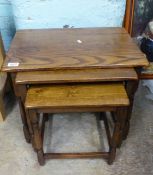 Nest of three oak occasional tables.