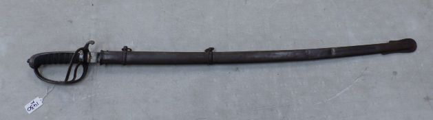 A British artillery officers sword and scabbard, the blade etched with foliate panels, shagreen