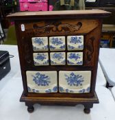 Reproduction spice cabinet in the Dutch style with 6 small blue and white ceramic drawers over 2