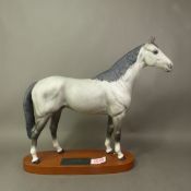 Beswick Connoisseur model of 'Hunter' presented on wooden plinth, height 34cm