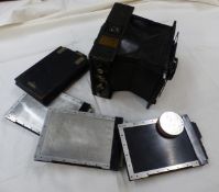 An early 20th century C.P Goerz - Berlin slide camera and slides, fitted with a Goerz Dogmar F =