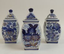 Chinese porcelain lidded ginger jars, featuring a blue and white floral pattern with gilt