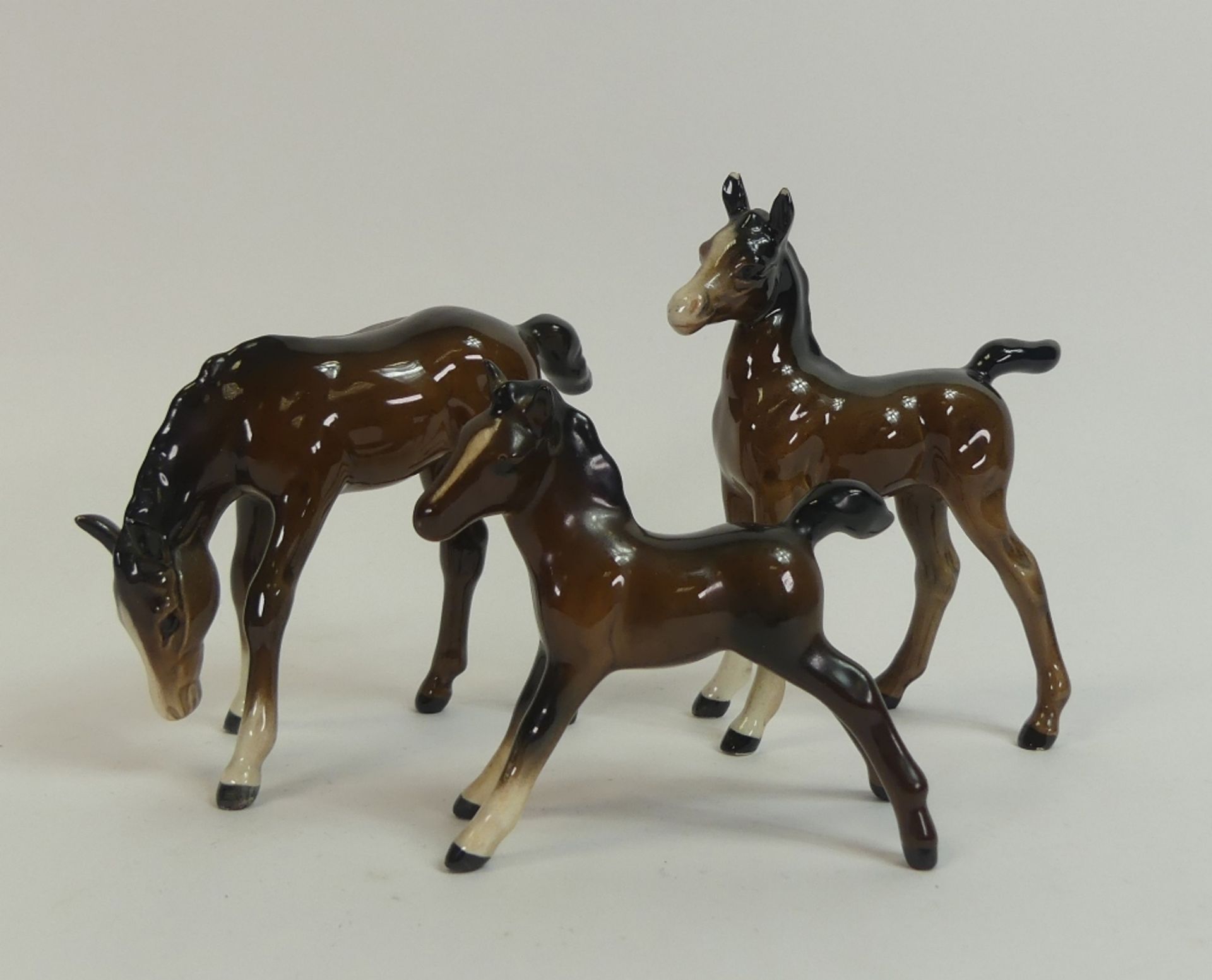 Beswick, to include head down, stretched and standing foals. (3)