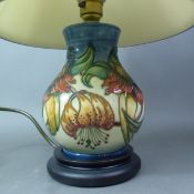 Moorcroft Anna Lily pattern table lamp, original Moorcroft silk shade, height 40cm overall.