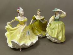 Royal Doulton lady figurines to include Lynne HN2329, Ninette HN2379 and Buttercup HN2309. (H: 21.