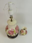 Moorcroft table lamp in the Pink Magnolia pattern, together with small vase in the Pink Hibiscus