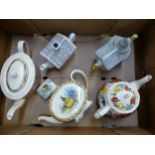 A collection of 4 Sadler teapots, together with a Johnson Bros example (1 tray).