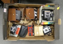 A collection of cameras to include Halina 35 X Mark II, Kodak Brownie Reflex 20, Poleroid Super
