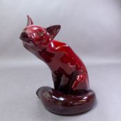 Royal Doulton large Flambe seated Fox, signed Noke, height 24cm.