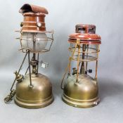 A vintage Tilley X246 Guardsman brass pressure lantern together with a similar Tilley PL53 brass