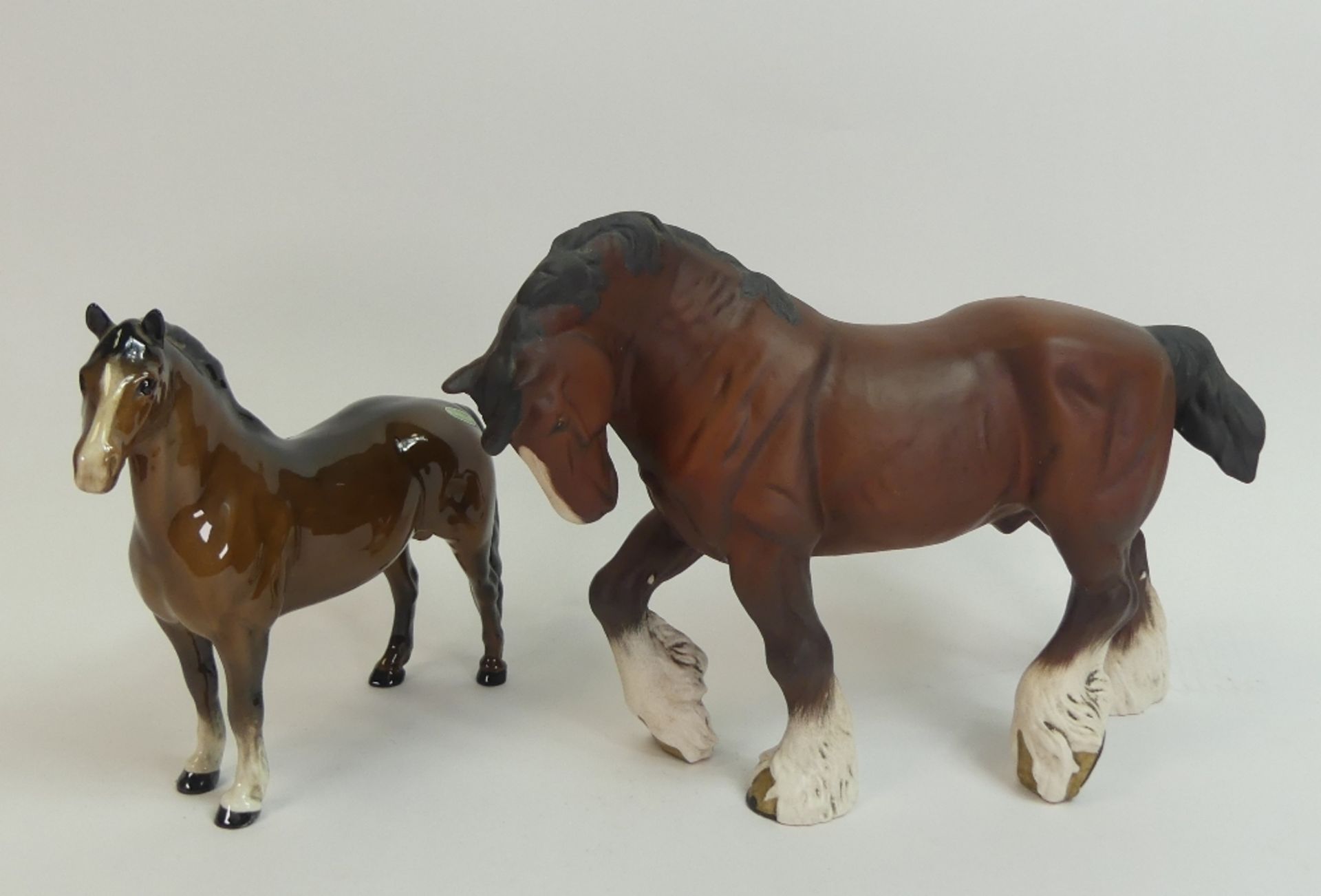 Beswick, bay Welsh Cob, model no.1793, in gloss, together with walking Shire, in matt. (2)