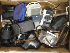 A collection of camera equipment to include Olympus OM10 35mm camera, Mamiya/Sekor 528TL 35mm