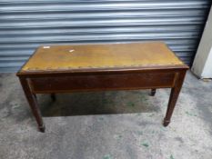 Oak hinged top double width stool with leather top, raised on square supports with spade feet, W