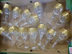 De Lamerie, fourteen heavily gilt decorated Crystal glass wine glasses. (1 Tray)
