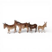 Beswick Donkey family 2267A, 1364B and foal 2110. (4)