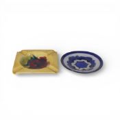 Moorcroft Dawn pattern saucer, diameter 11.5cm, together with a Hibiscus pattern on yellow ground