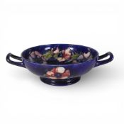 William Moorcroft footed, twin handled bowl, Anemone pattern on cobalt blue ground, max diameter