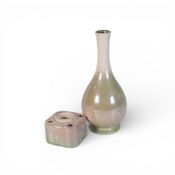 Moorcroft lustre vase in green and cream, together with a candlestick holder in the same finish,