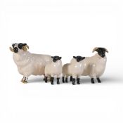 Beswick, Ram family compromising Black Face Ram 3071, Sheep 1765 and two lambs 1828. (4)