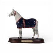 Beswick model of Champion Welsh Mountain Pony, in grey gloss with blue rug on wood plinth, h.23cm.