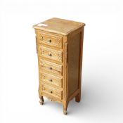 Antique French Louis XV style oak tallboy chest of drawers, featuring cabriole legs and ornate