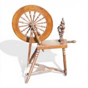 Early 20th century wooden spinning wheel.