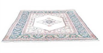 Extra large rug, 100% Wool Pile, in burgundy with blue and browns on a beige central field with a