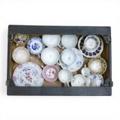 A collection of 18/19th century porcelain tea cups, coffee cups and saucers in various patterns from