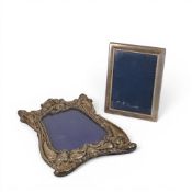 Silver Art Nouveau large photo frame on stand, h.36 x 23cm, some dents and wear, together with