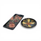 Moorcroft oblong pin dish in the Oberon pattern on dark blue and washed pink ground, together with