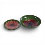 Moorcroft small footed bowl and pin dish in the Anemone pattern on green. (D: 14cm) (2)