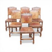 Jacobean style oak country dining chairs with original padded leather upholstery & brass stud