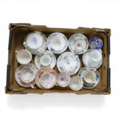 A collection of 18/19th century porcelain tea cups, coffee cups and saucers in various patterns from