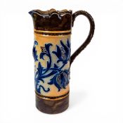 Mark V Marshall, Royal Doulton Lambeth stoneware ewer, decorated with incised foliate pattern in