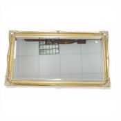Large wall mirror in gilt frame, 132 x 73cm.