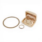 yellow metal eternity ring set with brown stones, size P, electronically tested to be 9ct gold,1.6g,