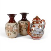Two Vases presented with Art Nouveau floral motifs on cream ground with brown glazed necks