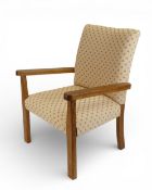 Mid-century children's bridge chair, up-holstered in a dot-patterned fabric. Courier/collection