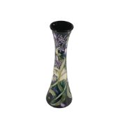 Moorcroft vase in the Isis pattern on blue ground, by Emma Bossons, 2003. (H: 31.5cm)