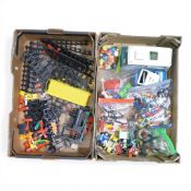 A collection of vintage Playmobile to include camper van, Police car, go-kart, lots of figures and